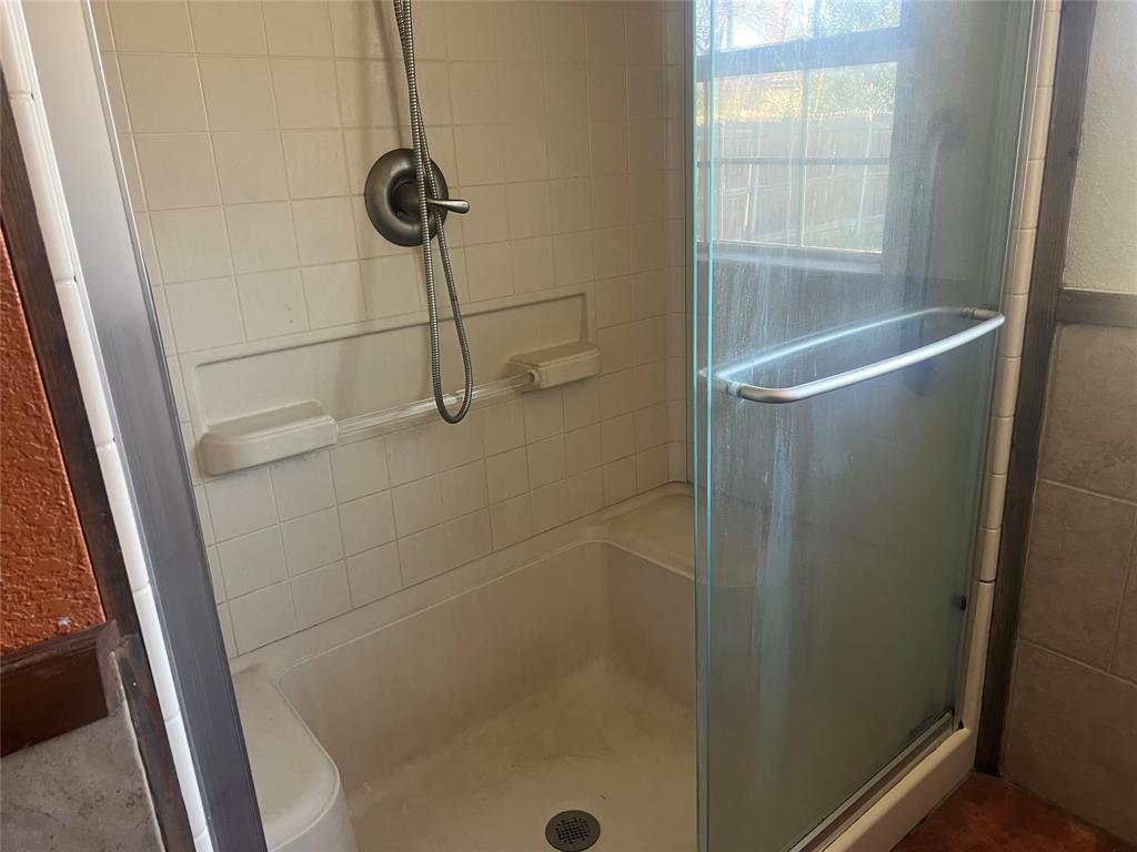 1721 Jocyle Street Arlington, TX 76010 - Photo 22 of 30 a bathroom with a shower