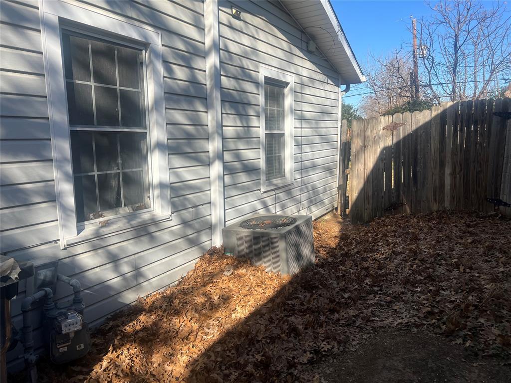 1721 Jocyle Street Arlington, TX 76010 - Photo 28 of 30 a view of a backyard of the house