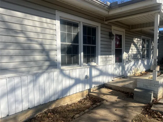 a view of a house with a large window