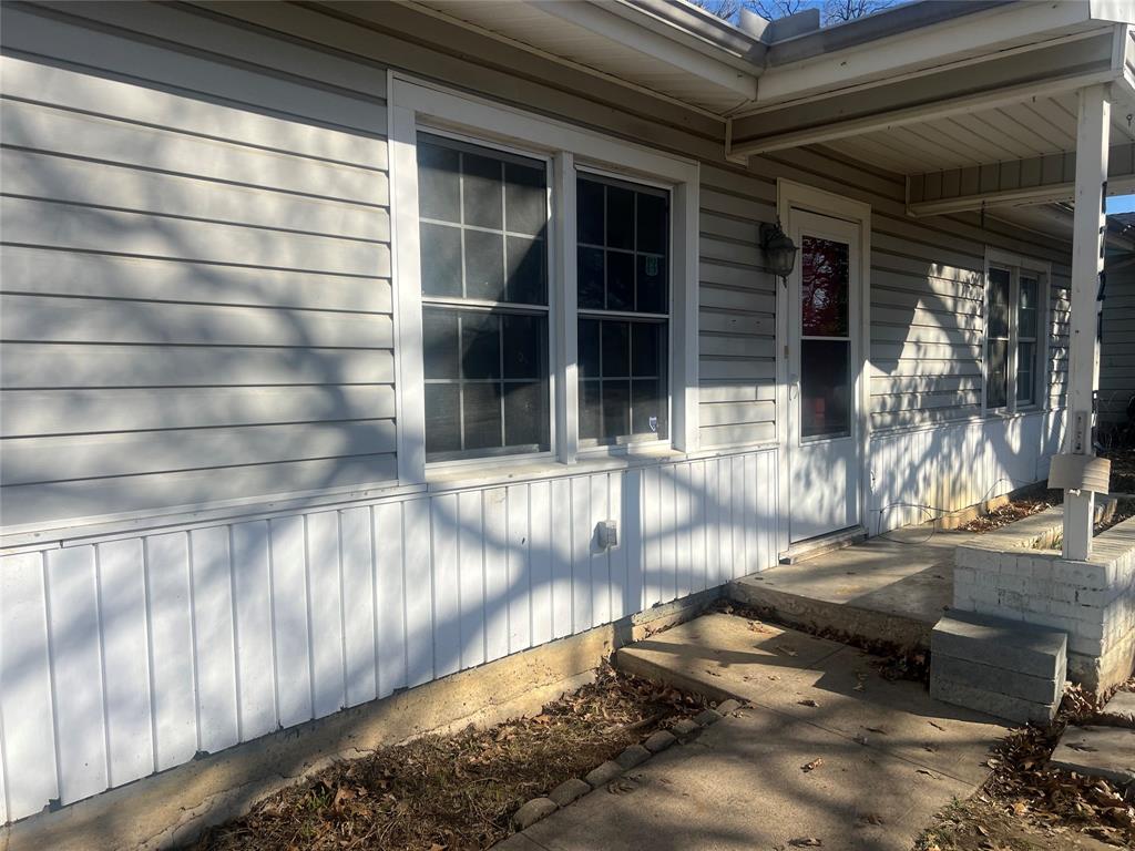 1721 Jocyle Street Arlington, TX 76010 - Photo 3 of 30 a view of a house with a large window