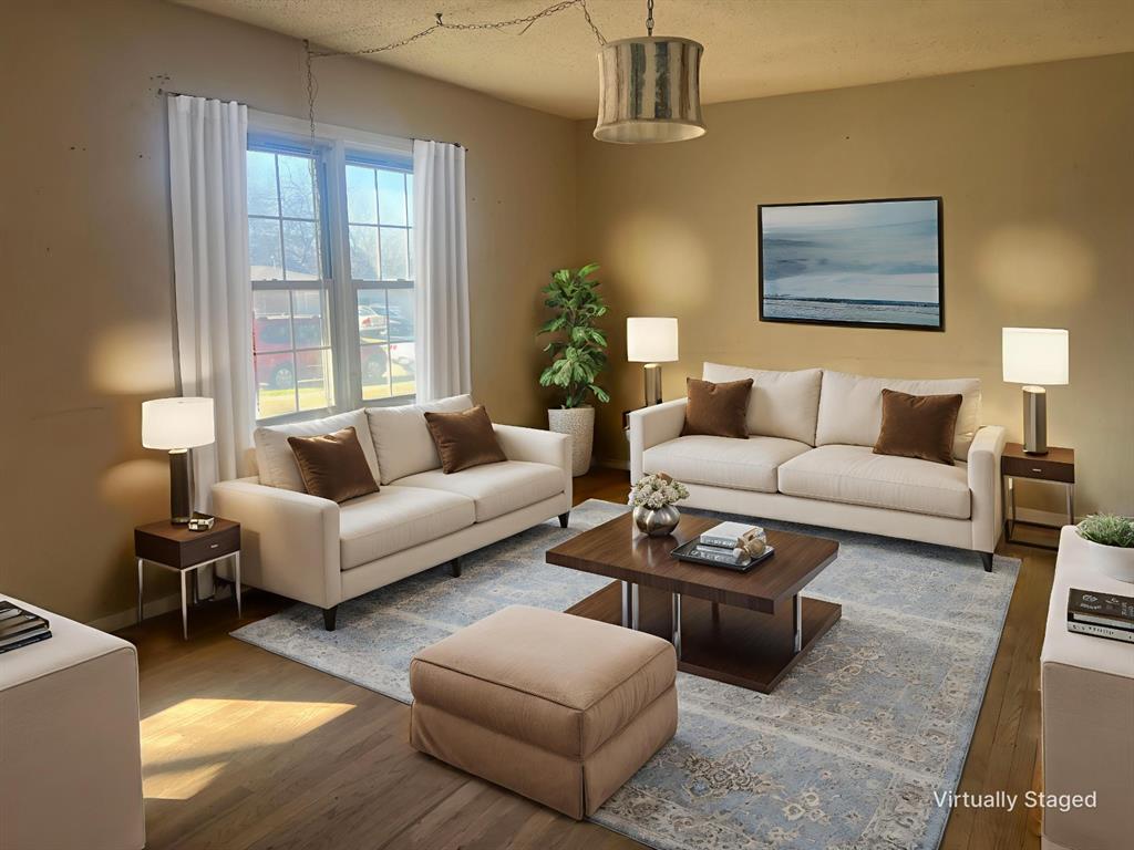 1721 Jocyle Street Arlington, TX 76010 - Photo 6 of 30 a living room with furniture and a large window