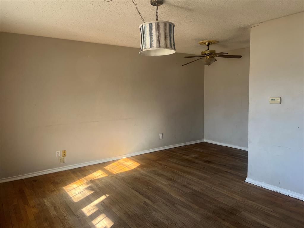 1721 Jocyle Street Arlington, TX 76010 - Photo 7 of 30 wooden floor in a empty room