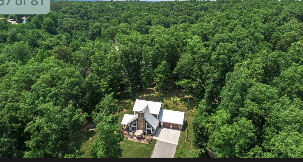 5560 Pinewood Road Franklin, TN 37064 - Photo 2 of 43 an aerial view of a house with yard