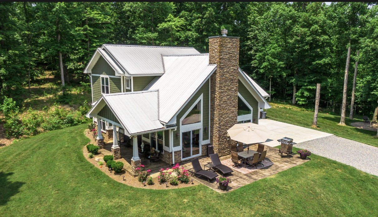 5560 Pinewood Road Franklin, TN 37064 - Photo 3 of 43 a view of a house with backyard porch and sitting area