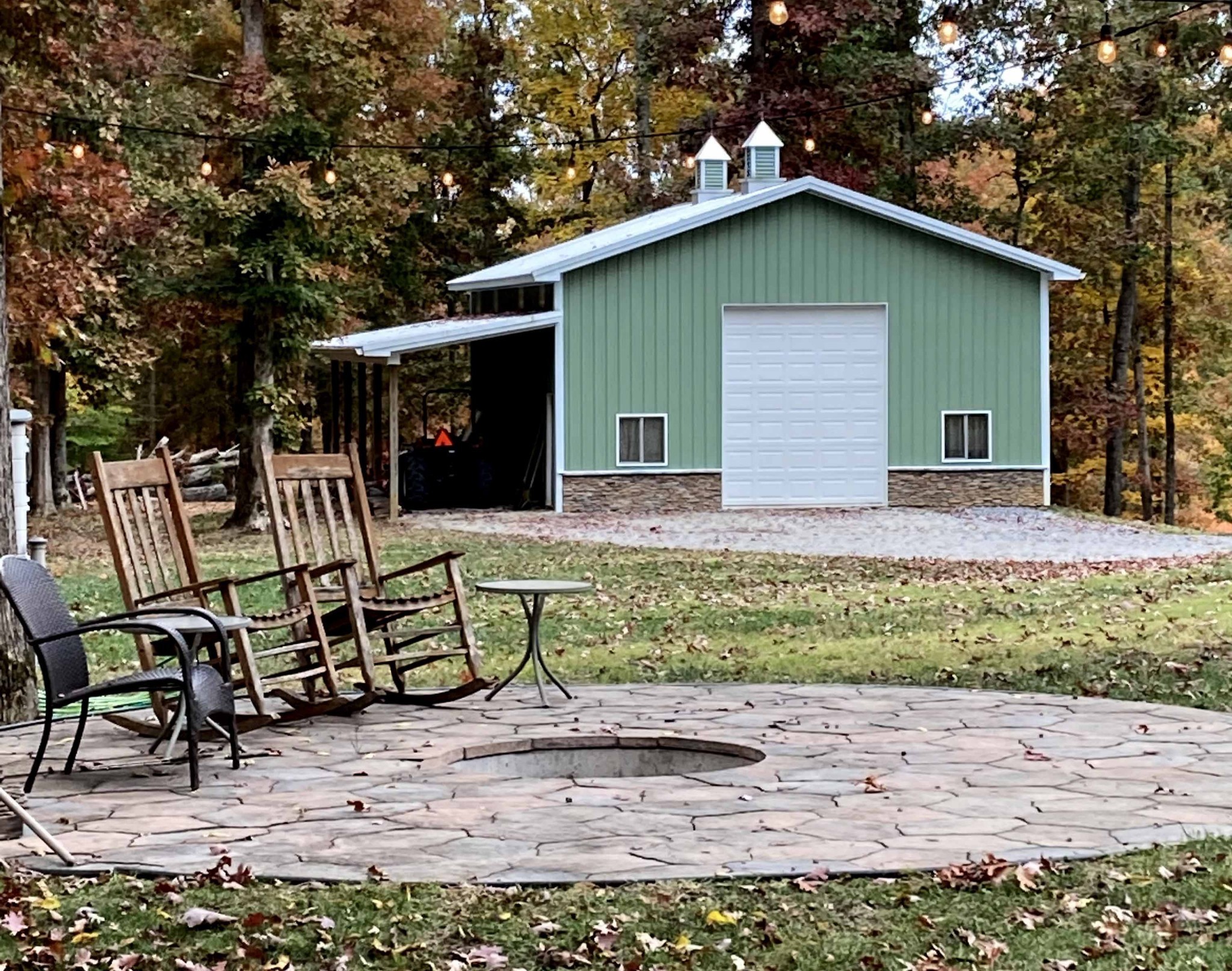 5560 Pinewood Road Franklin, TN 37064 - Photo 31 of 43 a backyard of a house with table and chairs