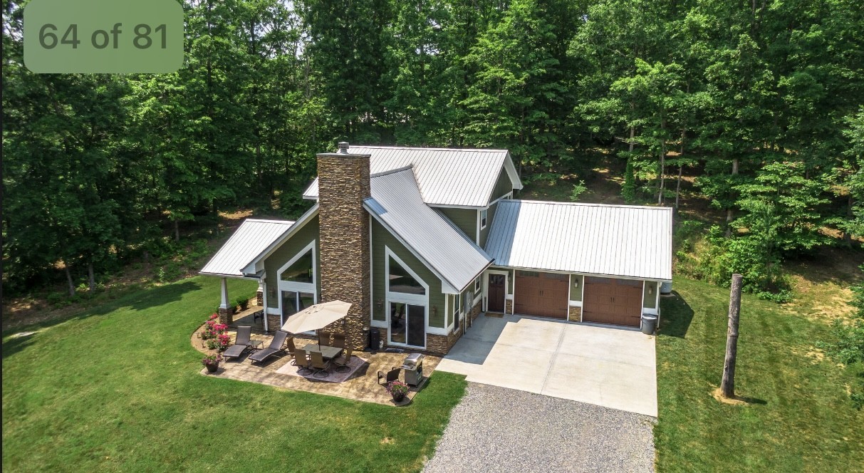 5560 Pinewood Road Franklin, TN 37064 - Photo 34 of 43 a view of a house with backyard and sitting area