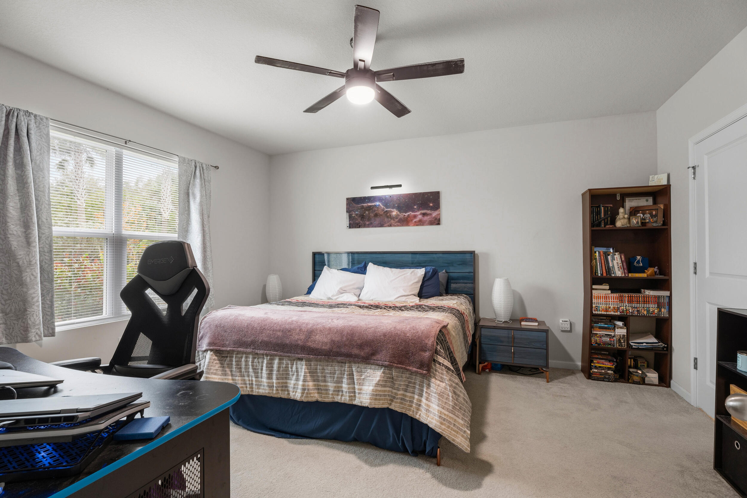 271 Raspberry Road Fort Pierce, FL 34981 - Photo 12 of 42 a bedroom with furniture and a window