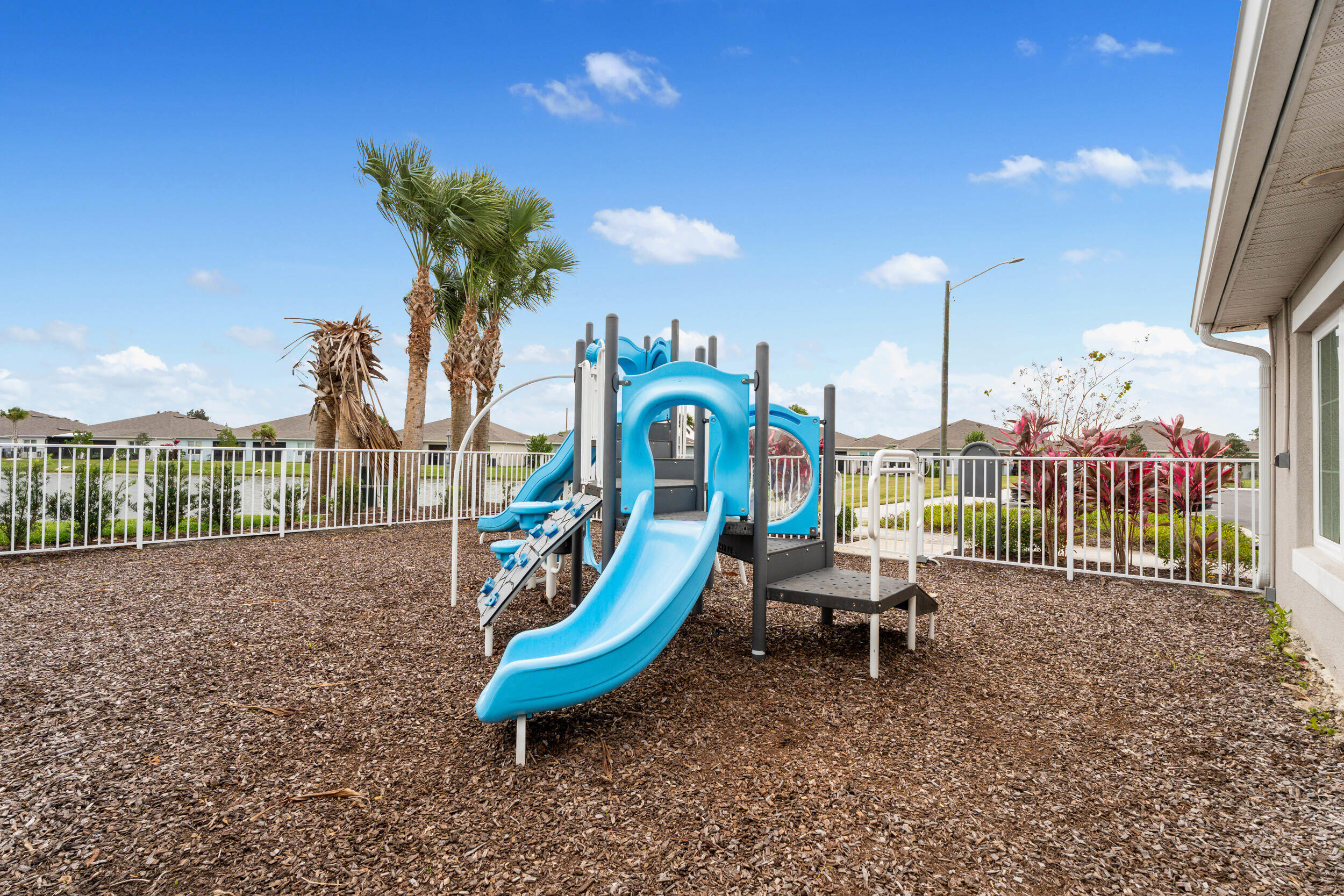 271 Raspberry Road Fort Pierce, FL 34981 - Photo 27 of 42 a garden view with a seating space