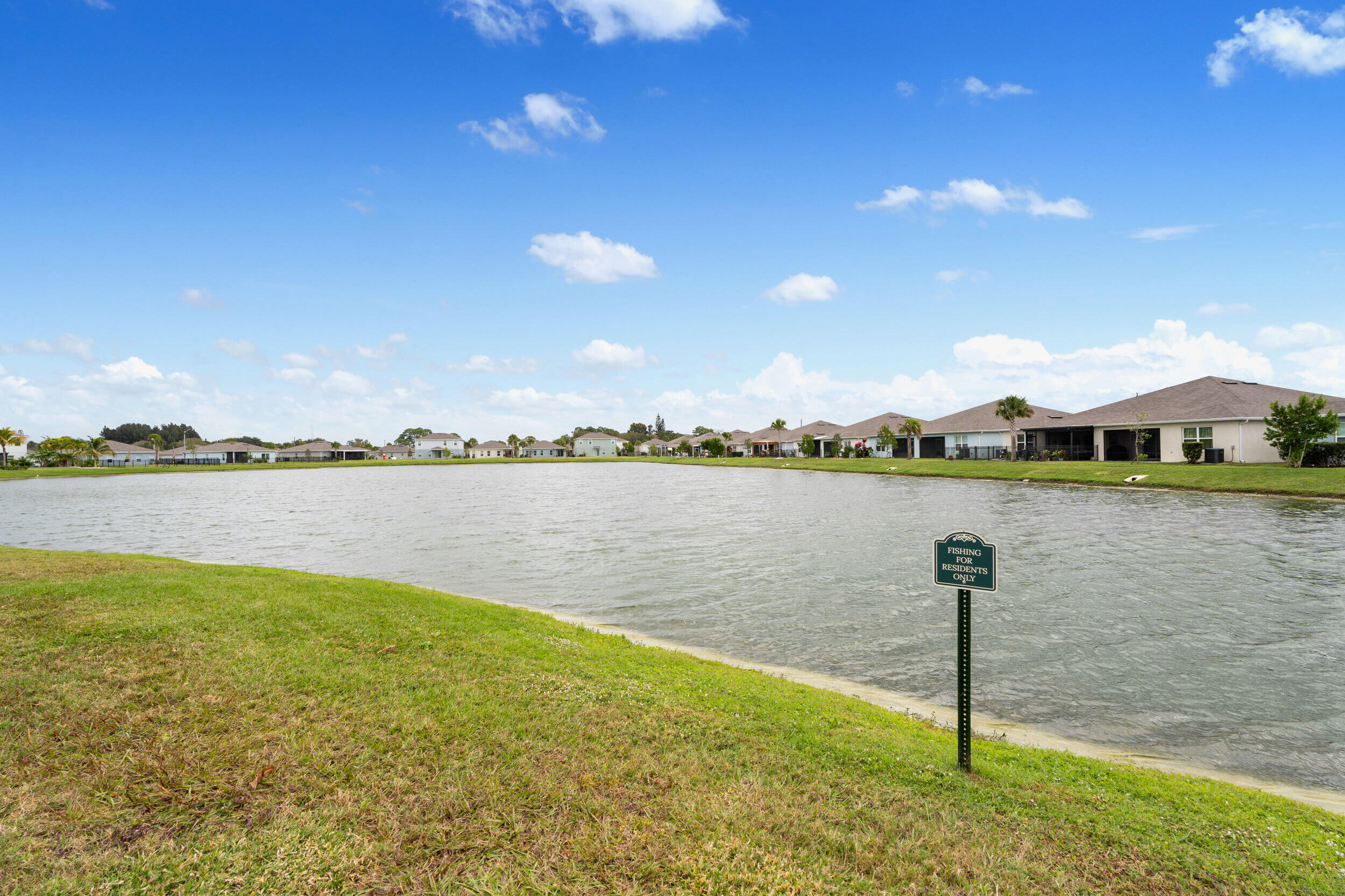 271 Raspberry Road Fort Pierce, FL 34981 - Photo 29 of 42 a lake view with houses in the back