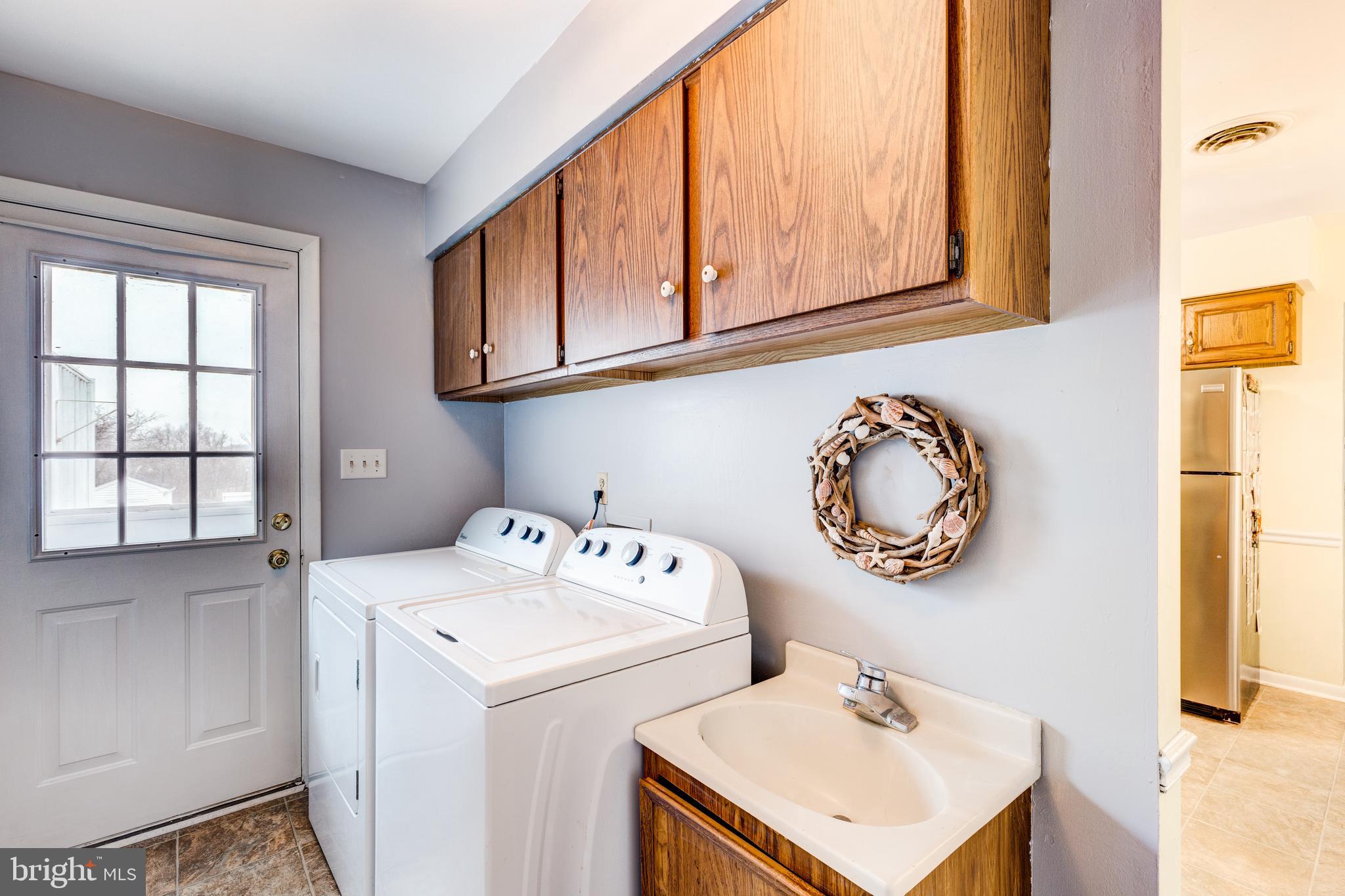 706 Sullivan Road Westminster, MD 21157 - Photo 27 of 51 LAUNDRY ON MAIN LEVEL AND ADDITIONAL IN THE LL