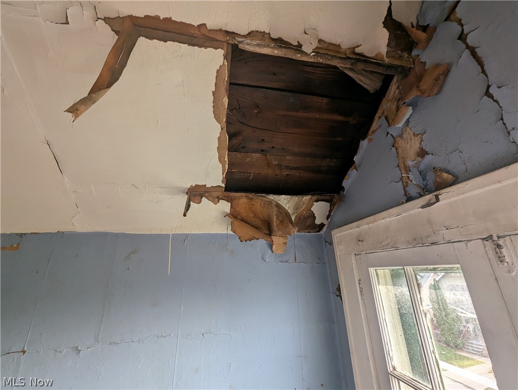 1449 Clearaire Road Cleveland, OH 44110 - Photo 22 of 23 roof damage upstairs