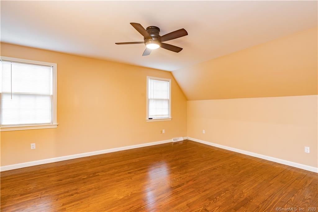 1241 Halladay Avenue West Suffield, CT 06078 - Photo 18 of 29 a view of a room with wooden floor and a ceiling fan