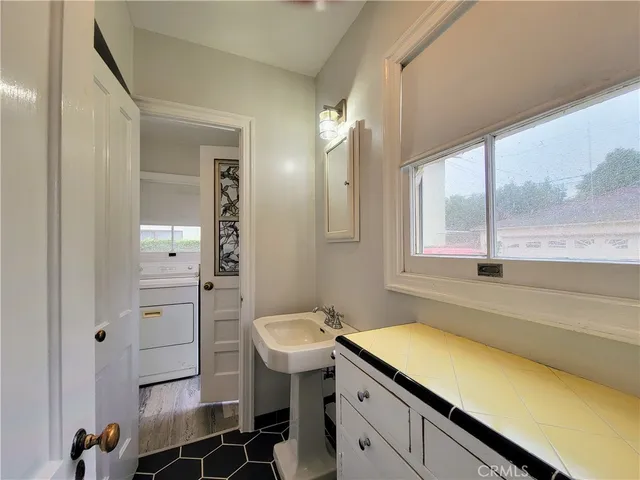 a bathroom with a sink and a bathtub