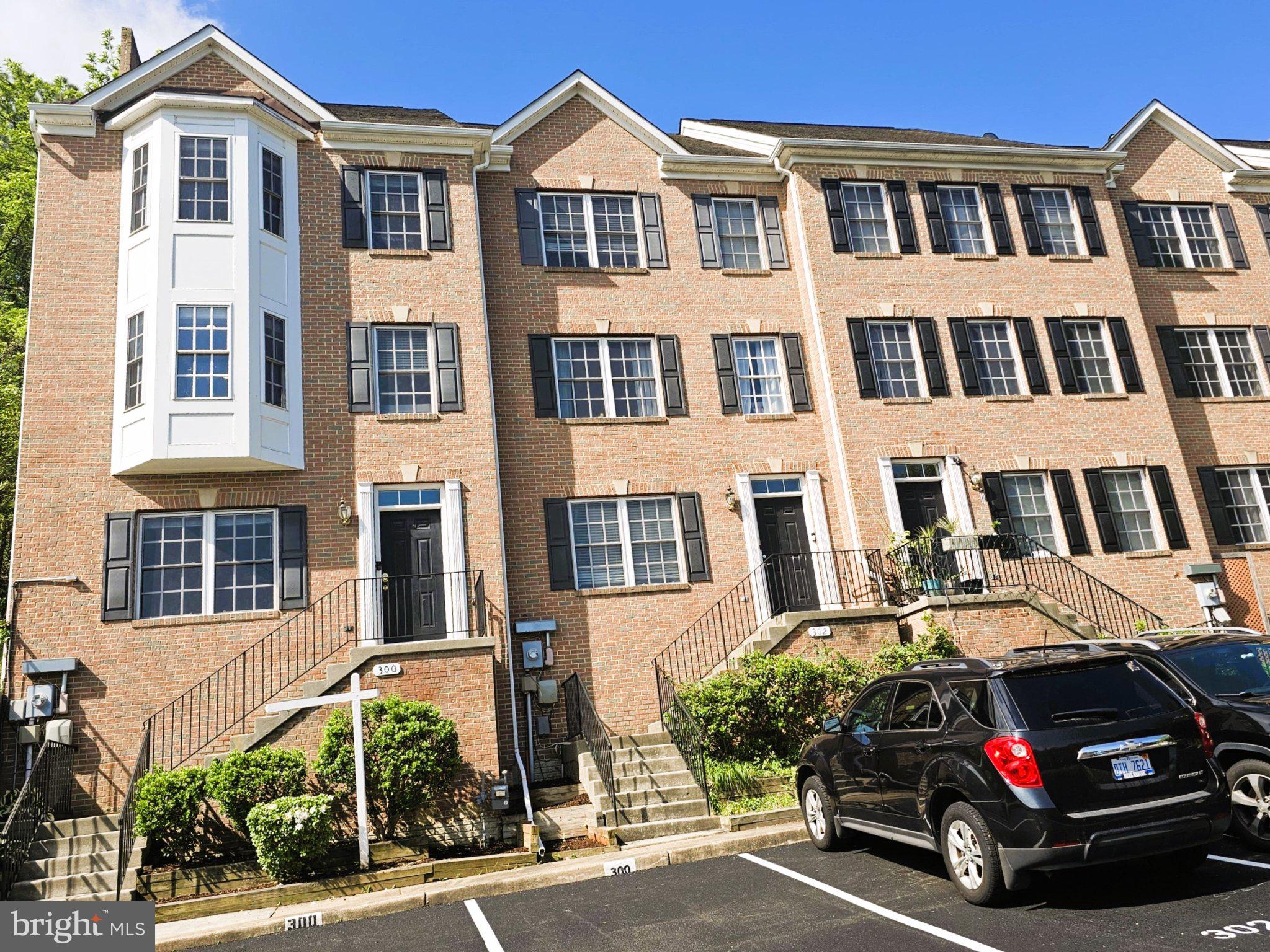 300 Center Lane Occoquan, VA 22125 - Photo 2 of 50 a car parked in front of a building