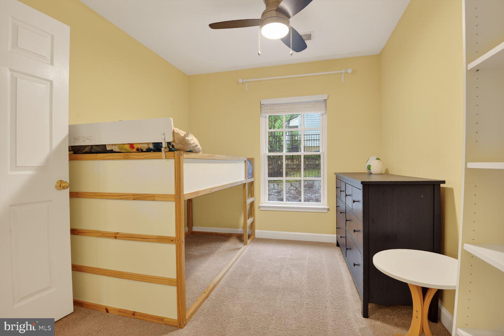 300 Center Lane Occoquan, VA 22125 - Photo 21 of 50 a bedroom with a bed and a window