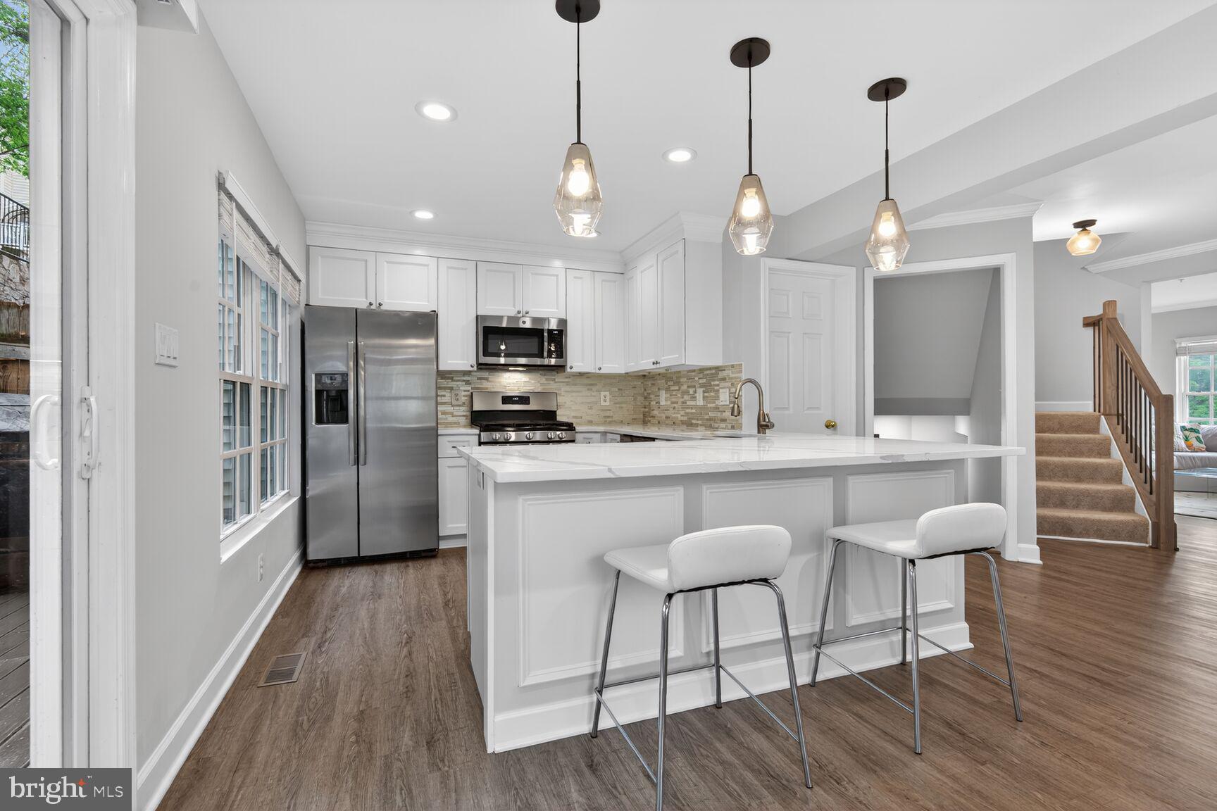300 Center Lane Occoquan, VA 22125 - Photo 4 of 50 Modern kitchen with sleek finishes.