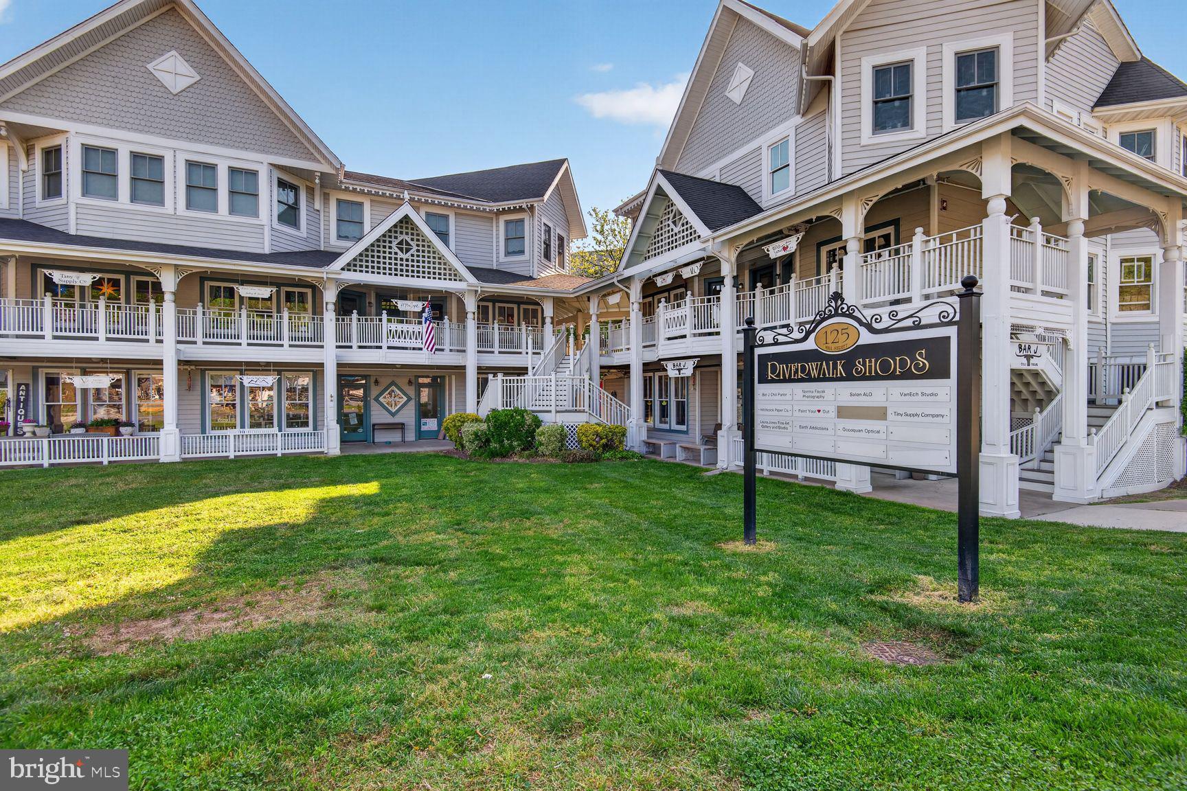 300 Center Lane Occoquan, VA 22125 - Photo 42 of 50 a front view of a building with a garden