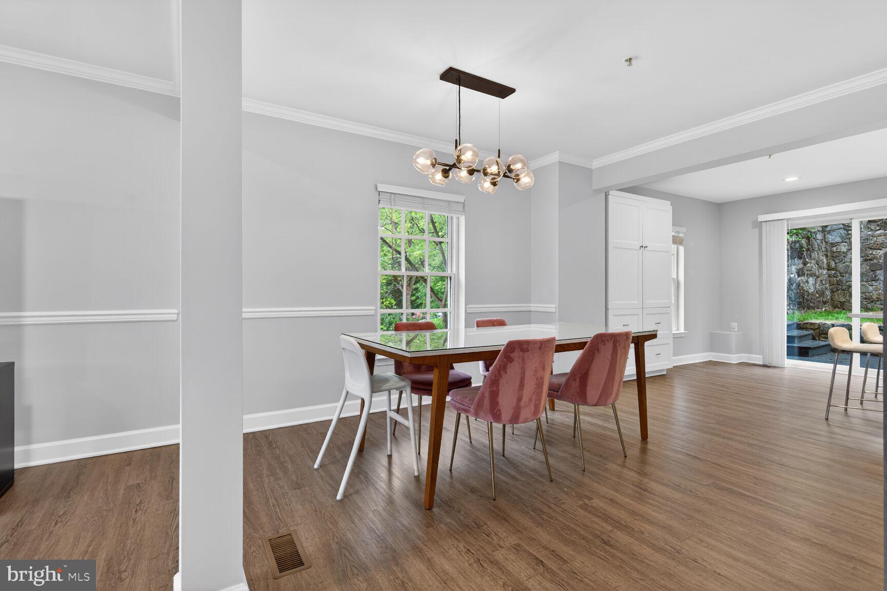 300 Center Lane Occoquan, VA 22125 - Photo 6 of 50 a view of a dining room with furniture and wooden floor