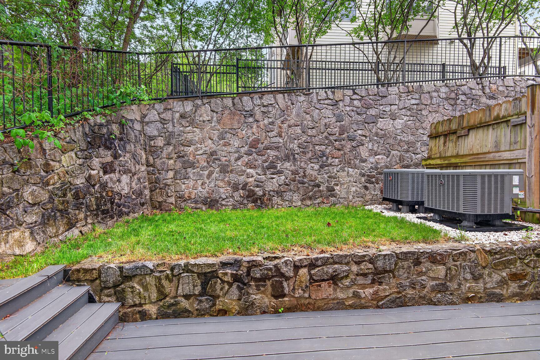 300 Center Lane Occoquan, VA 22125 - Photo 10 of 50 a view of a backyard with wooden fence