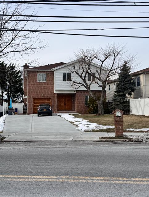 735 Woodrow Road Staten Island, NY 10312 - Photo 2 of 4 a house with a outdoor space