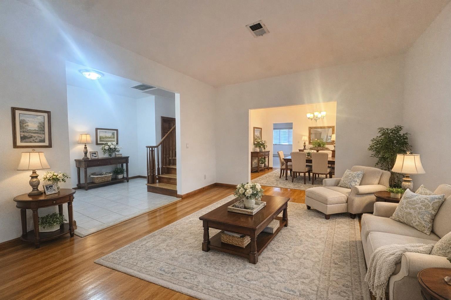 735 Woodrow Road Staten Island, NY 10312 - Photo 3 of 4 a living room with furniture and wooden floor