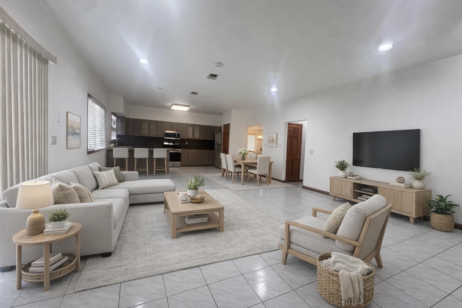 735 Woodrow Road Staten Island, NY 10312 - Photo 4 of 4 a living room with furniture and a flat screen tv