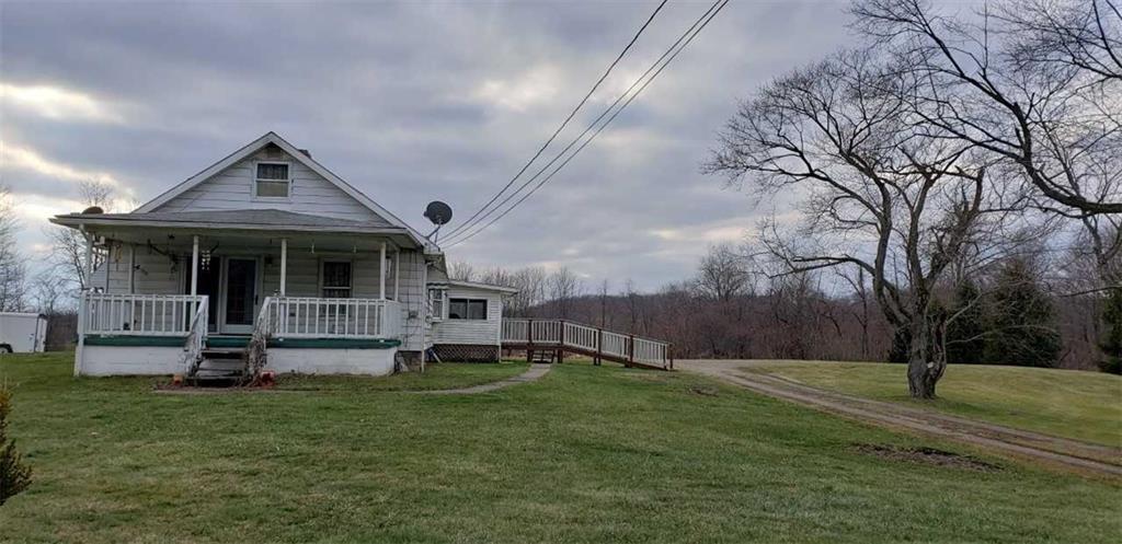 2096 Highway 168 Georgetown, PA 15043 - Photo 1 of 7 a front view of house with yard and green space