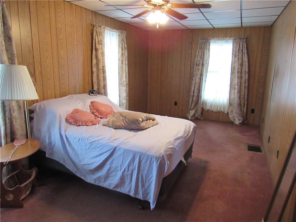 2096 Highway 168 Georgetown, PA 15043 - Photo 5 of 7 a bedroom with a bed and a window