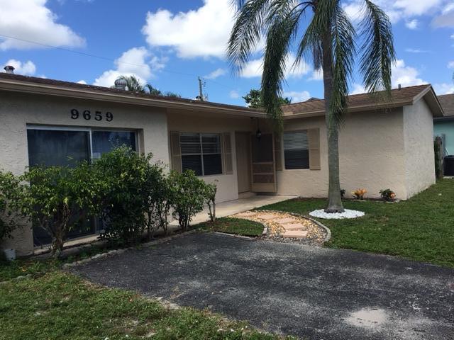 9659 Southwest 2nd Street Boca Raton, FL 33428 - Photo 2 of 16 Front