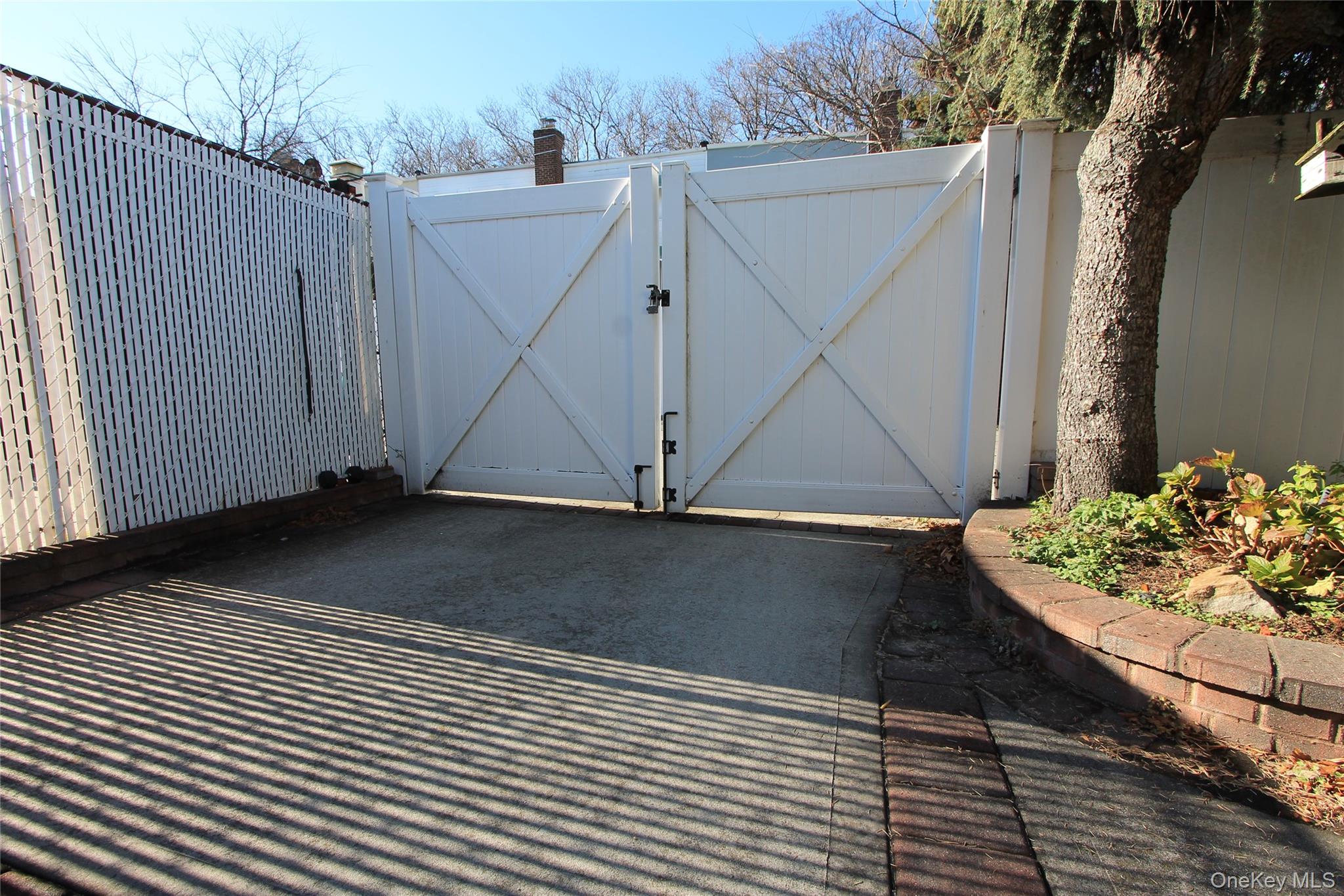 133-28 86th Street Queens, NY 11417 - Photo 17 of 17 a view of a entryway door with wooden floor