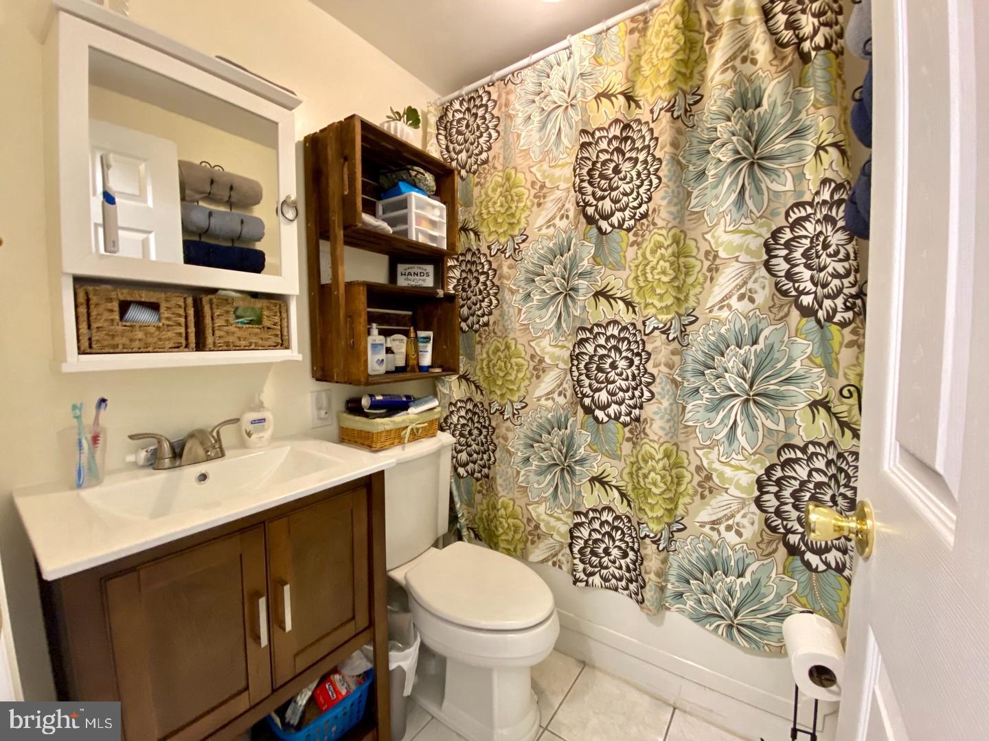 176 Moser Road Pottstown, PA 19464 - Photo 11 of 14 a bathroom with a sink toilet and shower