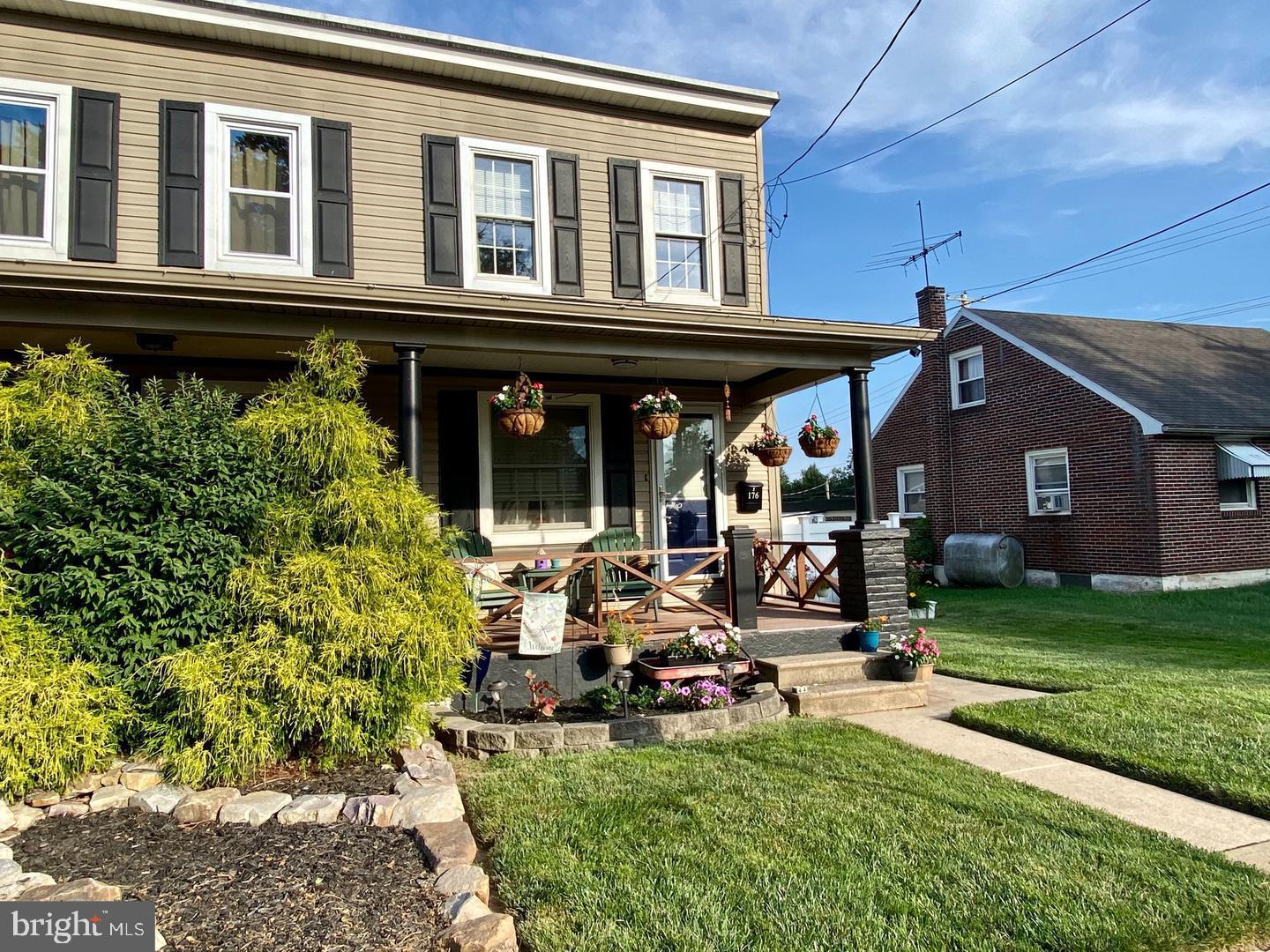 176 Moser Road Pottstown, PA 19464 - Photo 3 of 14 a view of a house with yard and sitting area