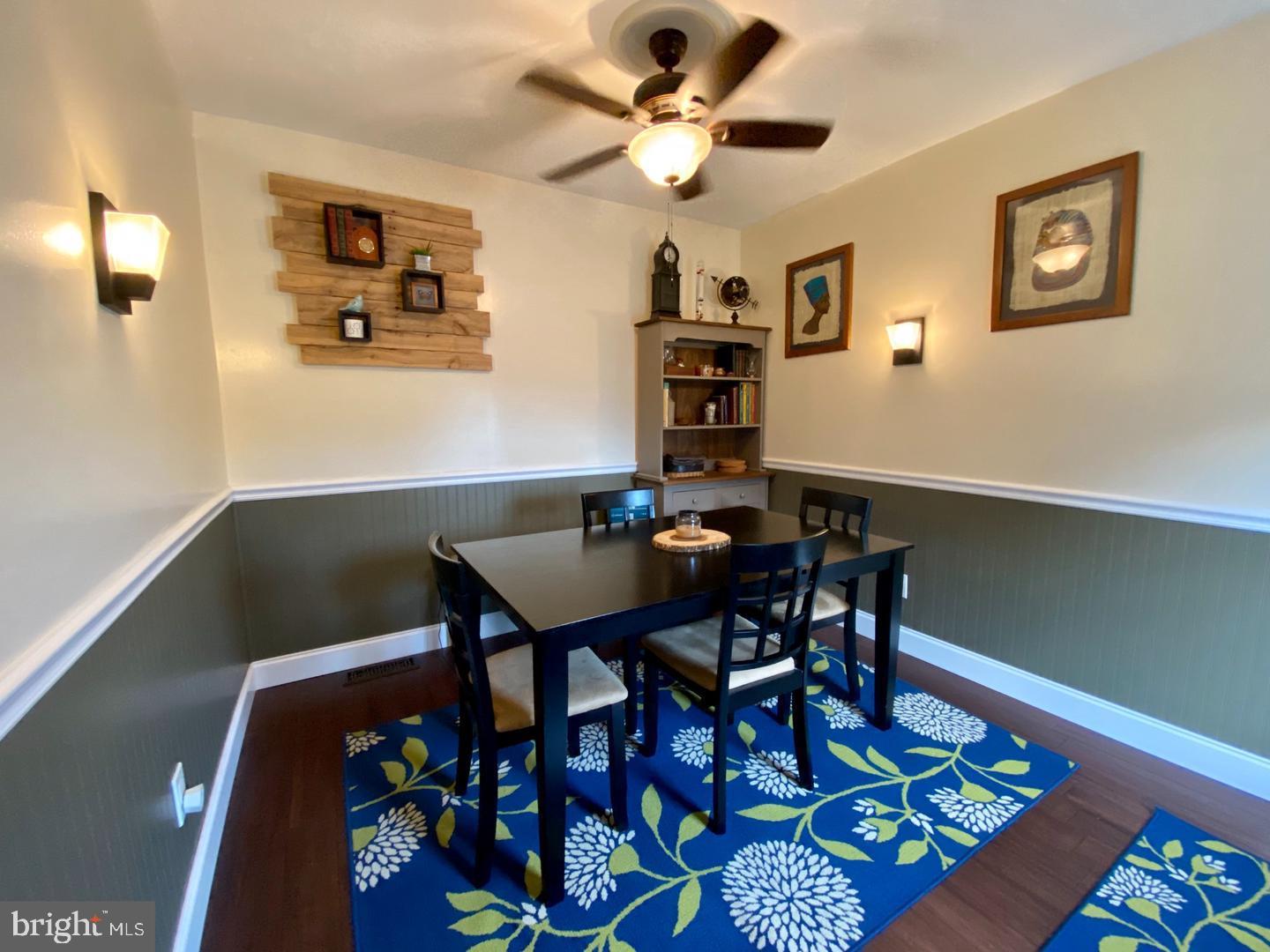 176 Moser Road Pottstown, PA 19464 - Photo 8 of 14 a view of a dining room with furniture and wooden floor