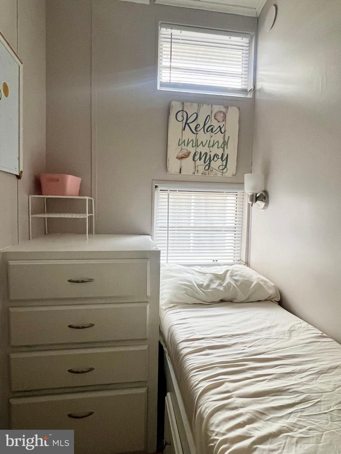 709 Seashore Road, Unit 626 Cape May, NJ 08204 - Photo 15 of 29 a bedroom with a bed and a window