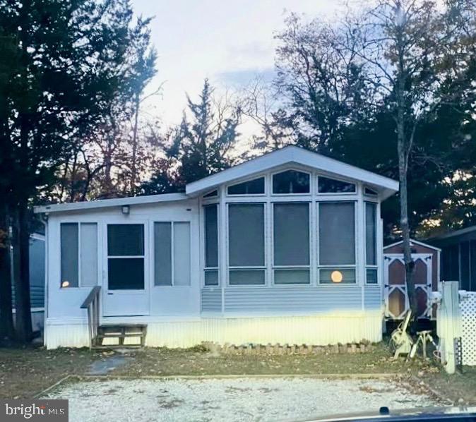 709 Seashore Road, Unit 626 Cape May, NJ 08204 - Photo 22 of 29 a front view of a house with a yard