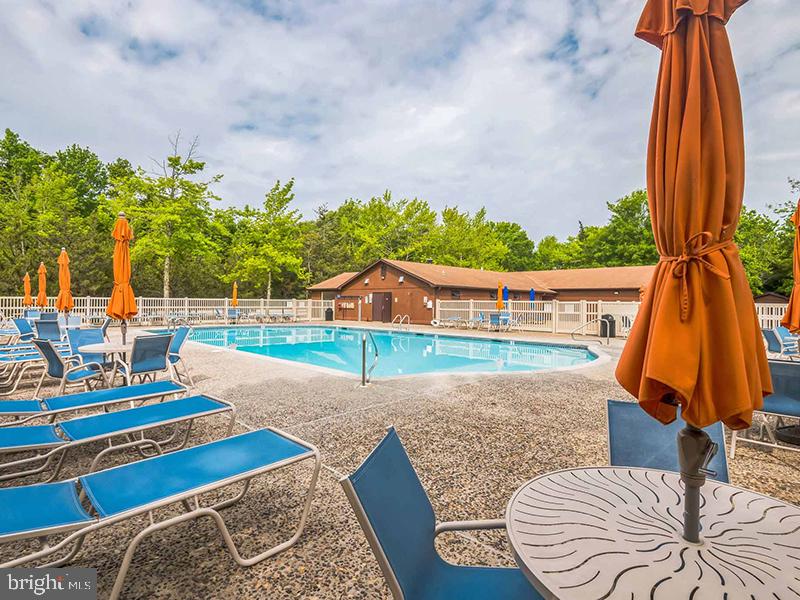 709 Seashore Road, Unit 626 Cape May, NJ 08204 - Photo 23 of 29 a front view of a house with a yard