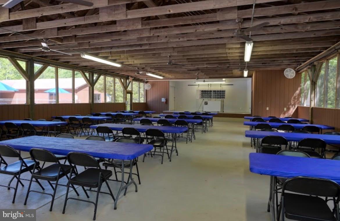 709 Seashore Road, Unit 626 Cape May, NJ 08204 - Photo 28 of 29 a view of a dinning table and chairs in the patio