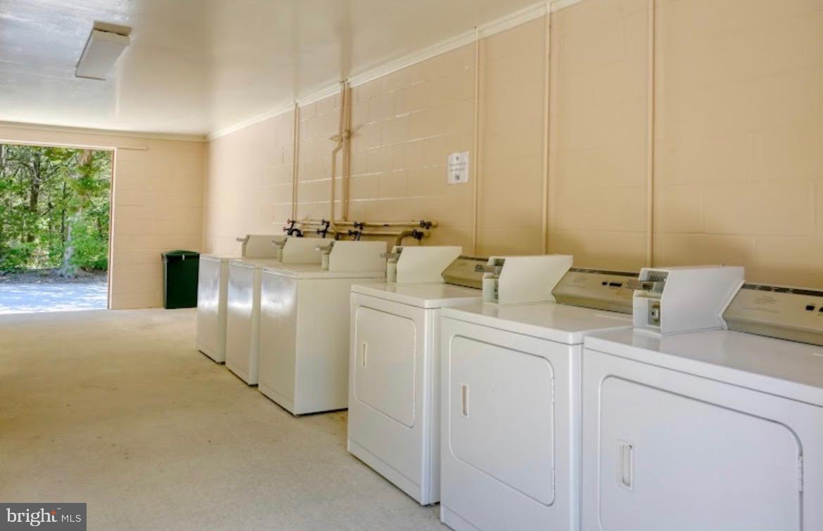709 Seashore Road, Unit 626 Cape May, NJ 08204 - Photo 29 of 29 a utility room with dryer and washer