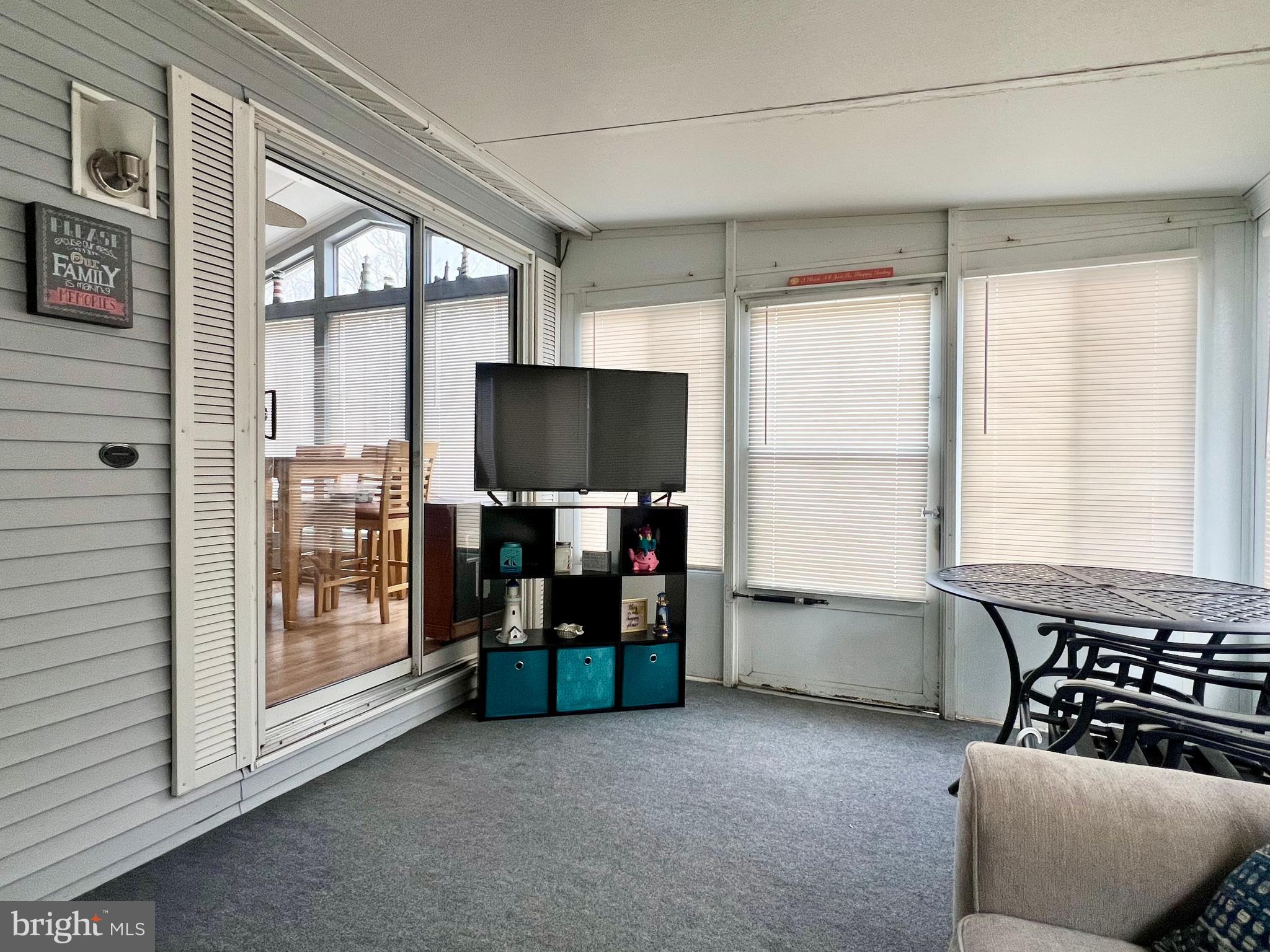 709 Seashore Road, Unit 626 Cape May, NJ 08204 - Photo 3 of 29 a living room with furniture and flat screen tv