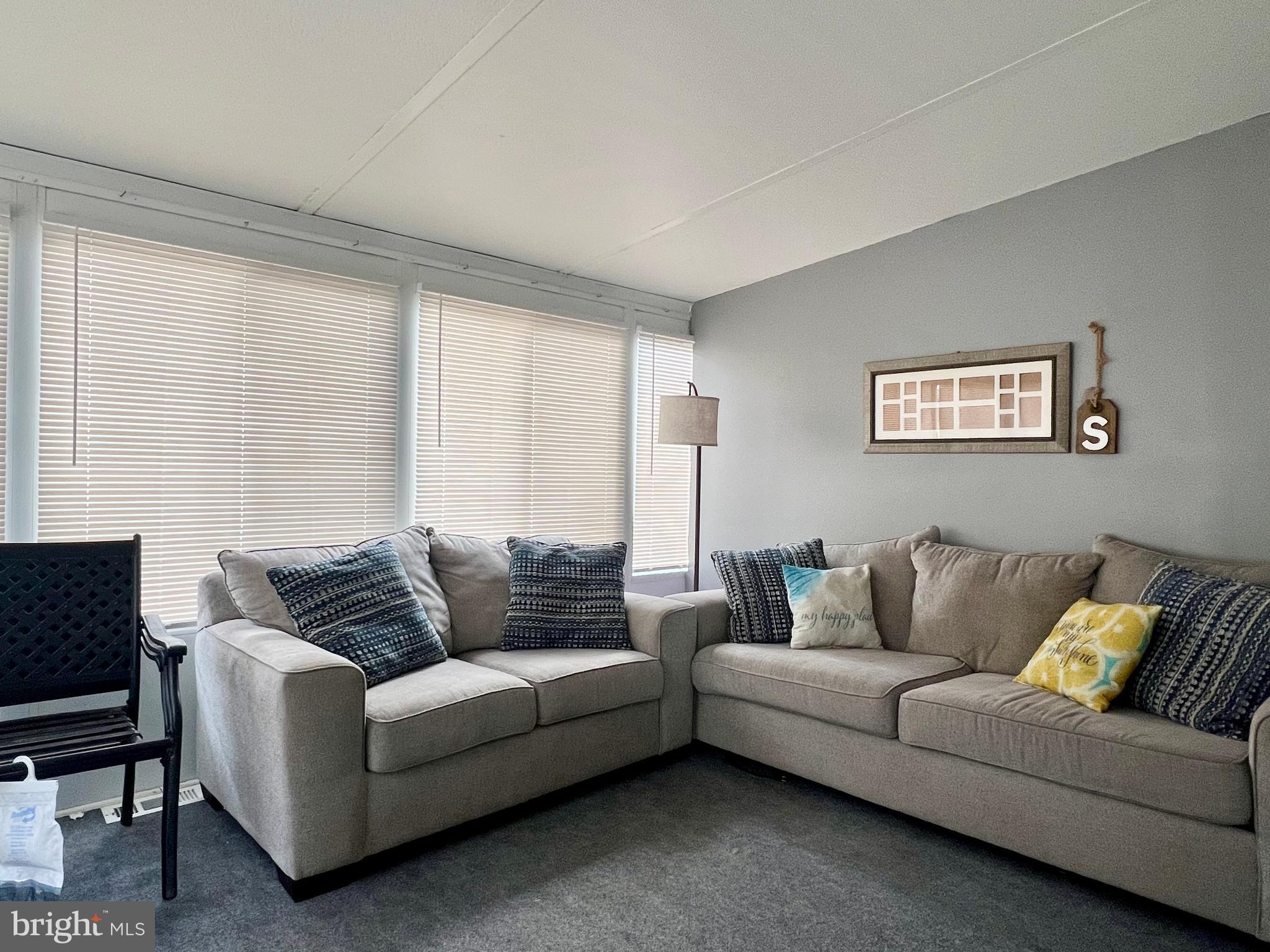 709 Seashore Road, Unit 626 Cape May, NJ 08204 - Photo 4 of 29 a living room with furniture and a couch