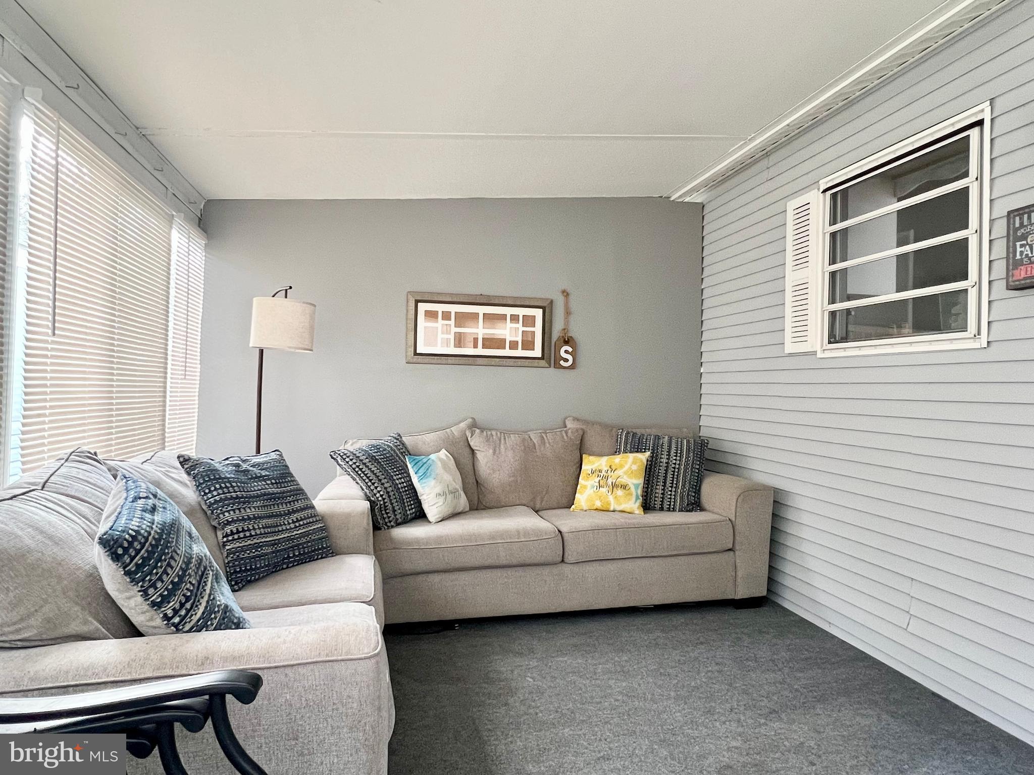 709 Seashore Road, Unit 626 Cape May, NJ 08204 - Photo 5 of 29 a living room with furniture and a window