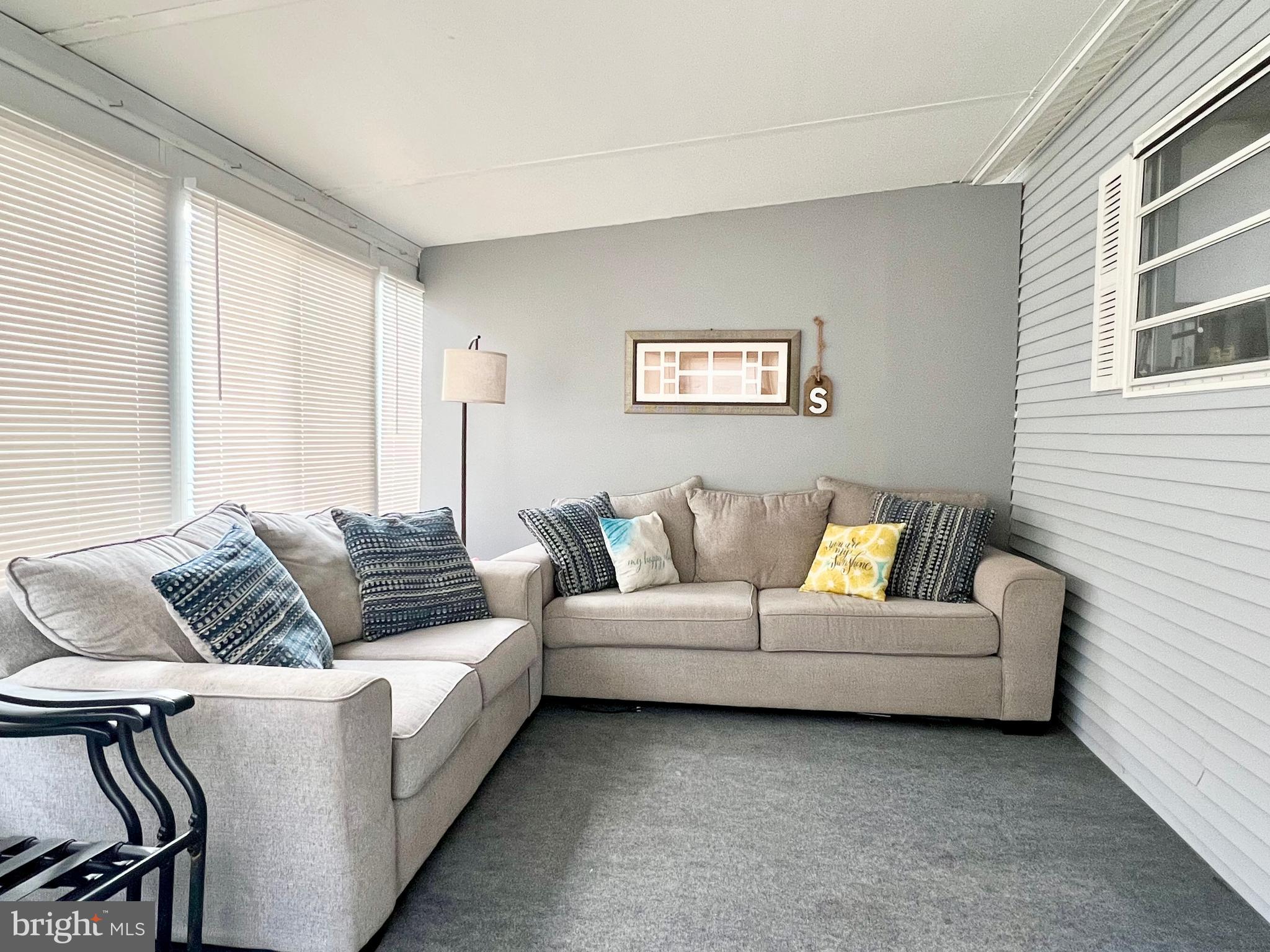 709 Seashore Road, Unit 626 Cape May, NJ 08204 - Photo 7 of 29 a living room with furniture and a window