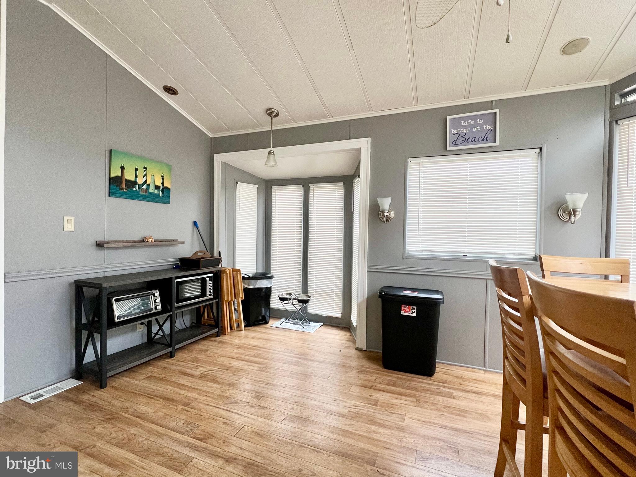 709 Seashore Road, Unit 626 Cape May, NJ 08204 - Photo 8 of 29 a view of a livingroom with furniture and window