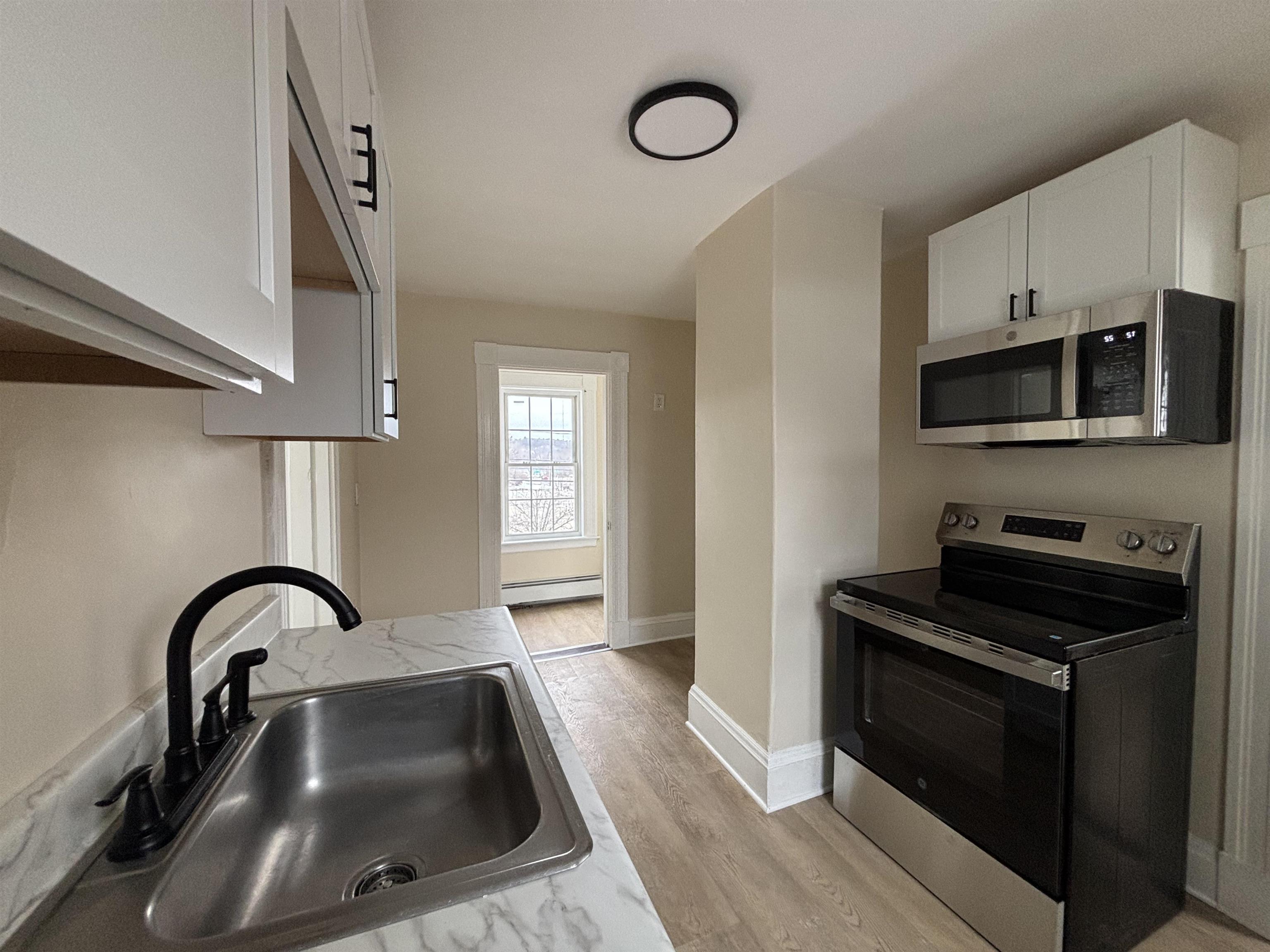 155 South Main Street, Unit 2 Franklin, NH 03235 - Photo 1 of 10