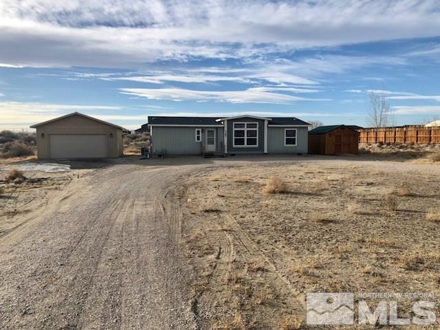 1165 Heidi Road Fallon, NV 89406 - Photo 1 of 1 a front view of a house with yard