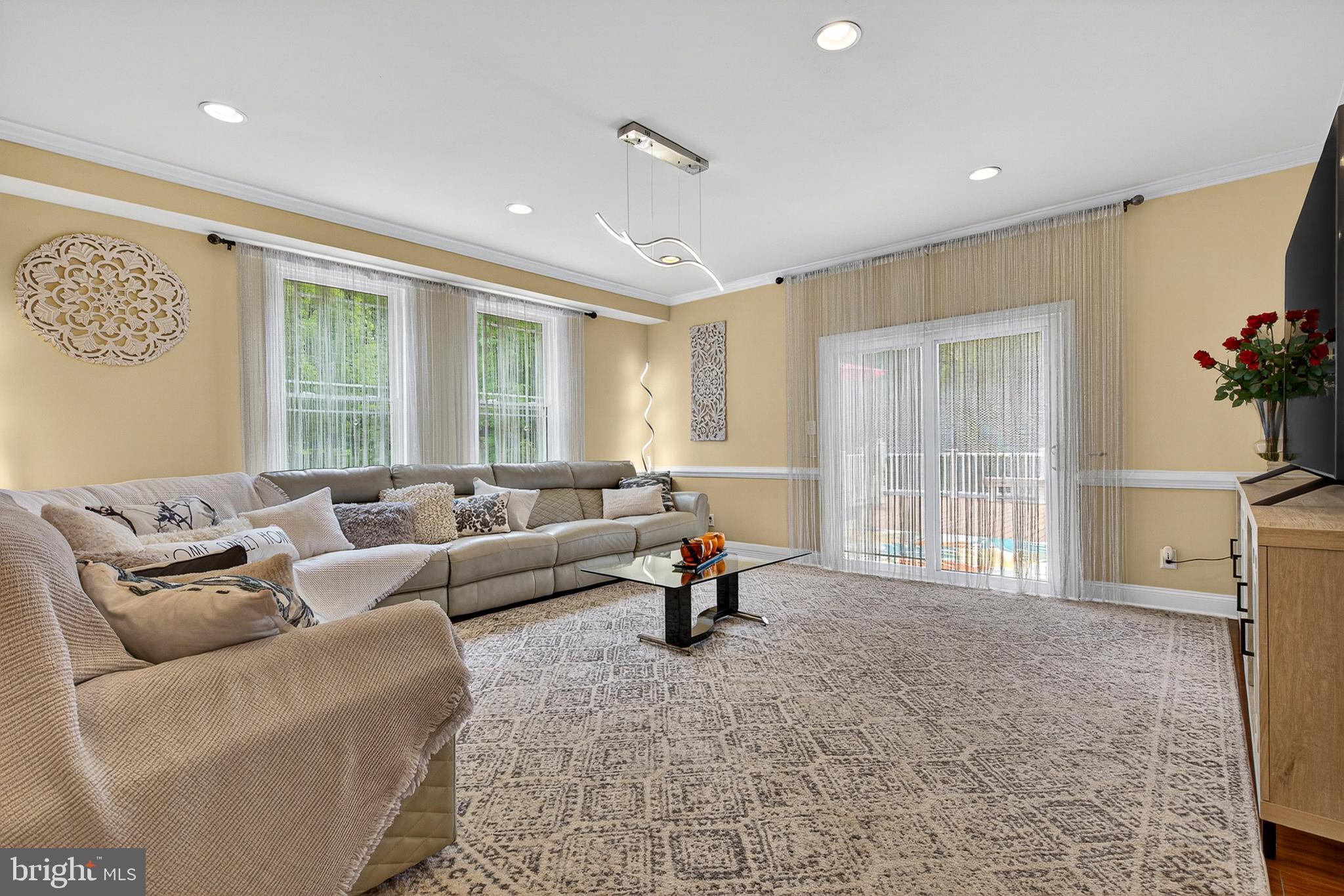 4603 Lathe Road Owings Mills, MD 21117 - Photo 23 of 87 LIVING ROOM WITH SLIDING DOORS TO 3 LEVELS DECK