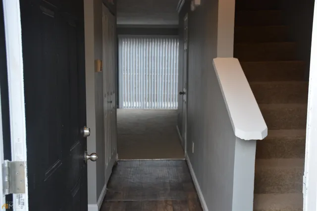 a view of hallway with washer and dryer