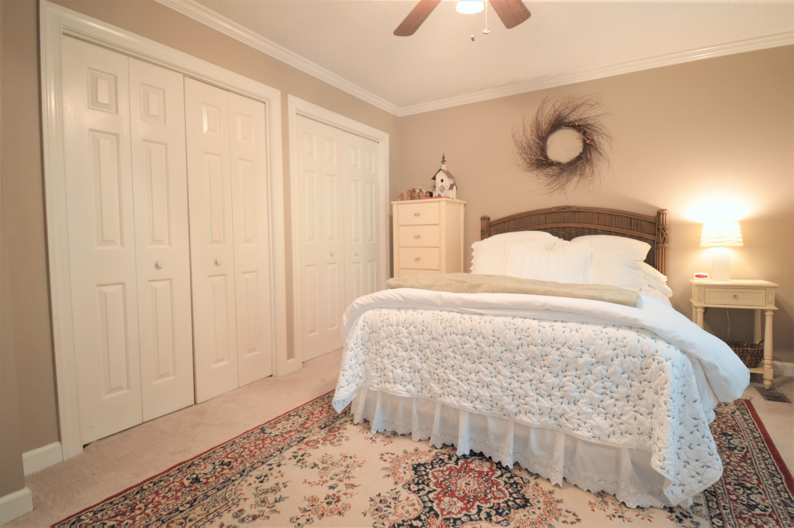 7008 Sandringham Drive Raleigh, NC 27613 - Photo 14 of 52 The owner's suite has lots of closet space, and crown molding. Owner's Suite