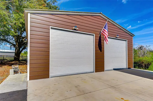 a view of a house with a garage