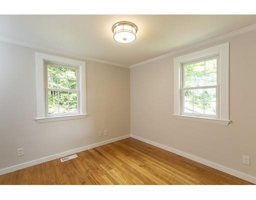 37 Tower Road Lexington, MA 02421 - Photo 9 of 20 a view of an empty room with wooden floor and a window